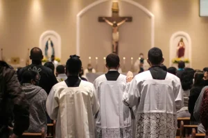 Photo by Felipe Balduino: https://www.pexels.com/photo/people-standing-inside-the-church-6134078/